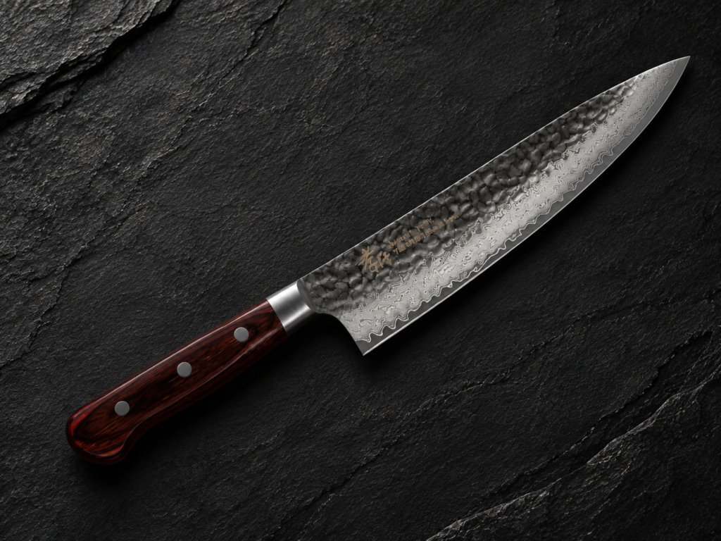 Sakai Takayuki VG10 Damascus Hammered Gyuto 210mm knife displayed on a dark slate background.